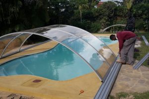 Installing pool enclosure